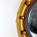 Antique Gilt Framed Convex Mirror with Eagle Finial.