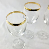 Set of Four Gold Rimmed Crystal Wine Glasses