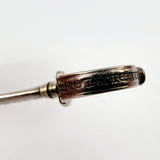 Gabriel Riddle london (C1830-1840) silver miniature sword in silver scabbard. This silver sword with its silver scabbard both have the makers name stamped on to them. G.Riddle London. The scabbard has it to the side and the sword is marked on the hilt or hand guard. Two minor dents and one small dent in the scabbard that does not effect the sword drawing out of it. Showing engraved name Measures: Height 6.1cm, Width 1cm, Depth 0.4cm.