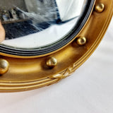 Antique Gilt Framed Convex Mirror with Eagle Finial.