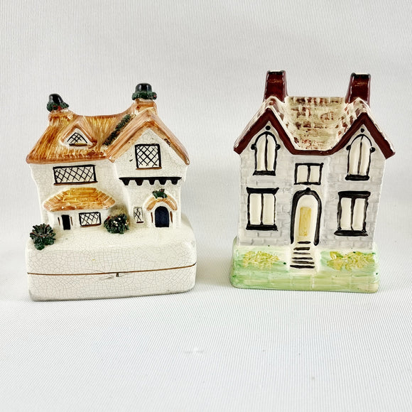 Two Antique Staffordshire House Designed Money Boxes.