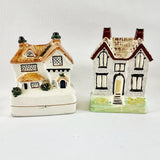 Two Antique Staffordshire House Designed Money Boxes.