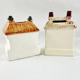Two Antique Staffordshire House Designed Money Boxes.