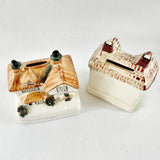 Two Antique Staffordshire House Designed Money Boxes.