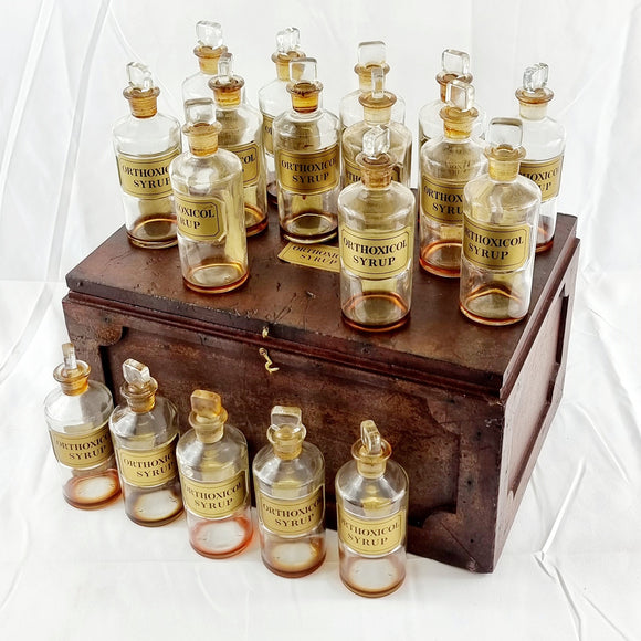 Antique 20th Century Orthoxicol Syrup Bottles in Fitted Box.
