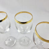 Set of Four Gold Rimmed Crystal Wine Glasses