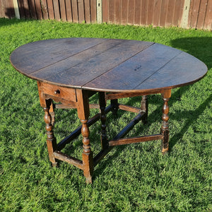 Antique Oak Drop leaf Table with 18th Century Legs.
