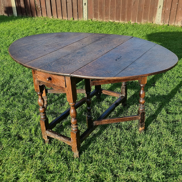 Antique Oak Drop leaf Table with 18th Century Legs.