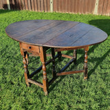 Antique Oak Drop leaf Table with 18th Century Legs.