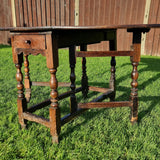Antique Oak Drop leaf Table with 18th Century Legs.