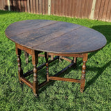 Antique Oak Drop leaf Table with 18th Century Legs.