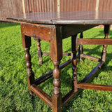 Antique Oak Drop leaf Table with 18th Century Legs.