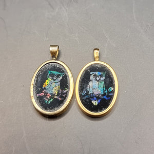 Two Antique Gold Opal and Onyx Owl Pendants.