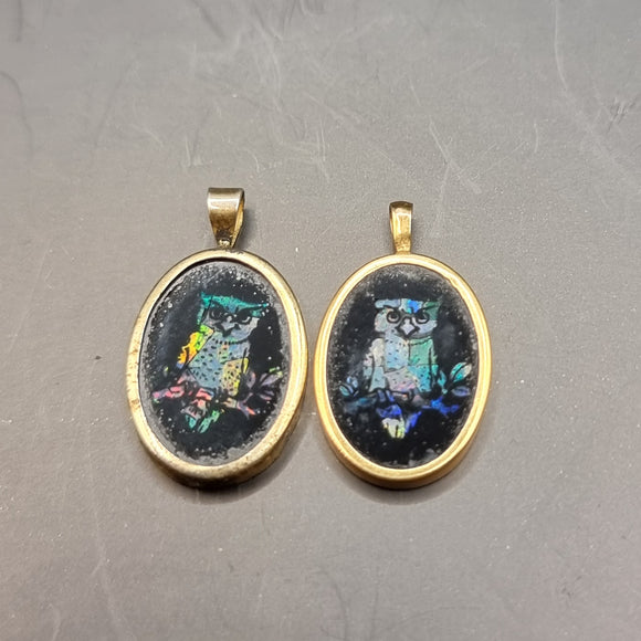 Two Antique Gold Opal and Onyx Owl Pendants.