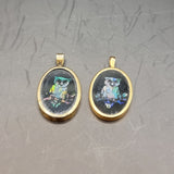 Two Antique Gold Opal and Onyx Owl Pendants.