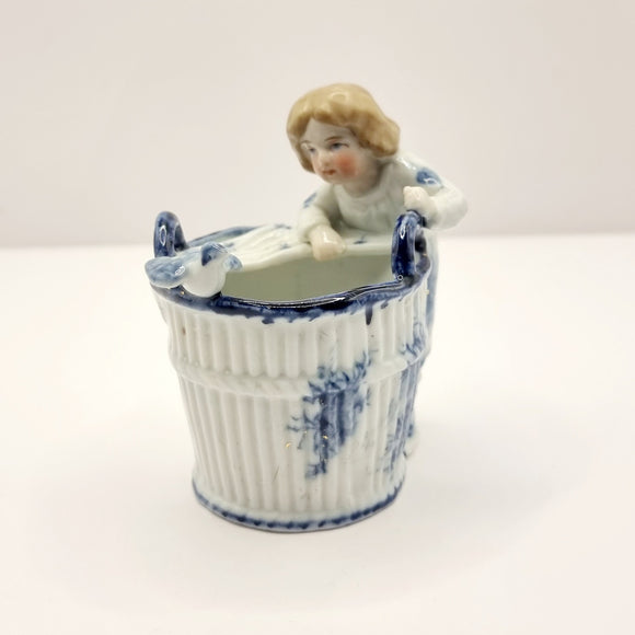 Antique German Blue and White Porcelain Figurine of Boy and Bird on Basket