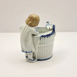 Antique German Blue and White Porcelain Figurine of Boy and Bird on Basket