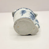 Antique German Blue and White Porcelain Figurine of Boy and Bird on Basket