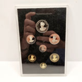 Collection of 8 Pobjot Mint Isle man Crowns along with 1979 Lesotho Coinage Set