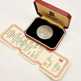 Collection of 8 Pobjot Mint Isle man Crowns along with 1979 Lesotho Coinage Set