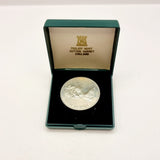 Collection of 8 Pobjot Mint Isle man Crowns along with 1979 Lesotho Coinage Set