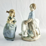 Two Nao by Lladro Figurines Boy with Goat and Girl with Dog.