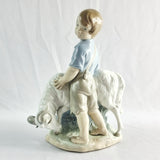 Two Nao by Lladro Figurines Boy with Goat and Girl with Dog.