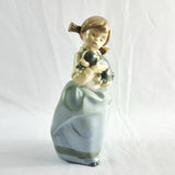 Two Nao by Lladro Figurines Boy with Goat and Girl with Dog.