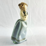 Two Nao by Lladro Figurines Boy with Goat and Girl with Dog.