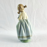 Two Nao by Lladro Figurines Boy with Goat and Girl with Dog.