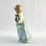 Two Nao by Lladro Figurines Boy with Goat and Girl with Dog.