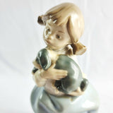 Two Nao by Lladro Figurines Boy with Goat and Girl with Dog.