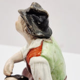 Antique Pair of Staffordshire Old man and Lady.