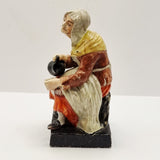 Antique Pair of Staffordshire Old man and Lady.