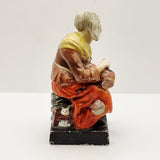 Antique Pair of Staffordshire Old man and Lady.
