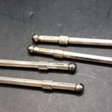 Set of Four Antique Sterling Silver Swizzle Sticks in Fitted Dorwin Case.