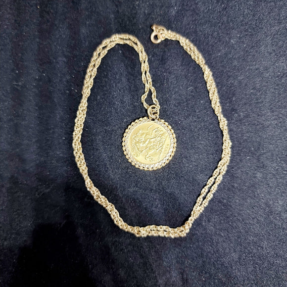 1914 Gold Half Sovereign in a 9ct Gold Mount and Chain