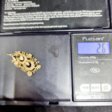 9ct Gold Horse Shoe, hearts and Floral Pendant