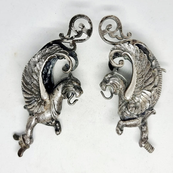 Antique Pair of Lion Headed Griffin Mascots.