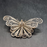 Four Vintage Silver and White Metal Wire Brooches