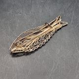 Four Vintage Silver and White Metal Wire Brooches