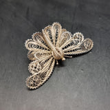 Four Vintage Silver and White Metal Wire Brooches