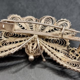 Four Vintage Silver and White Metal Wire Brooches