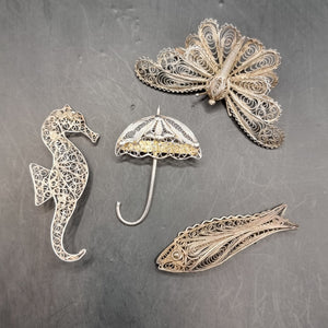 Four Vintage Silver and White Metal Wire Brooches