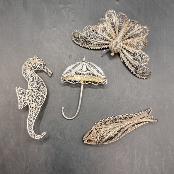 Four Vintage Silver and White Metal Wire Brooches