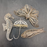 Four Vintage Silver and White Metal Wire Brooches