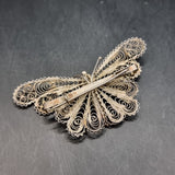 Four Vintage Silver and White Metal Wire Brooches