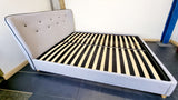Here is a second hand grey king size bed that's fits a 5 foot wide king-size mattress. The frame has some minor dust marks on it but is in good condition with all parts accounted for.  Measures 220cm Long x 174cm wide x 103cm high.  All slates intact 