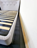 Here is a second hand grey king size bed that's fits a 5 foot wide king-size mattress. The frame has some minor dust marks on it but is in good condition with all parts accounted for.  Measures 220cm Long x 174cm wide x 103cm high. 