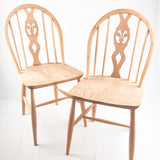 Pair of Ercol fleur-de-lis Windsor 2056 chairs
